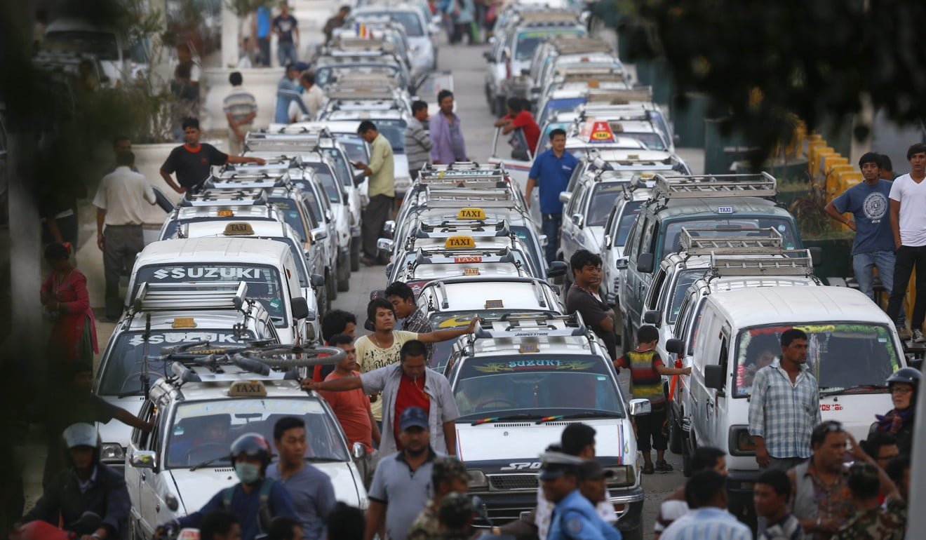 Taxi drivers wait for fuel in Kathmandu during the blockade. Photo: EPA