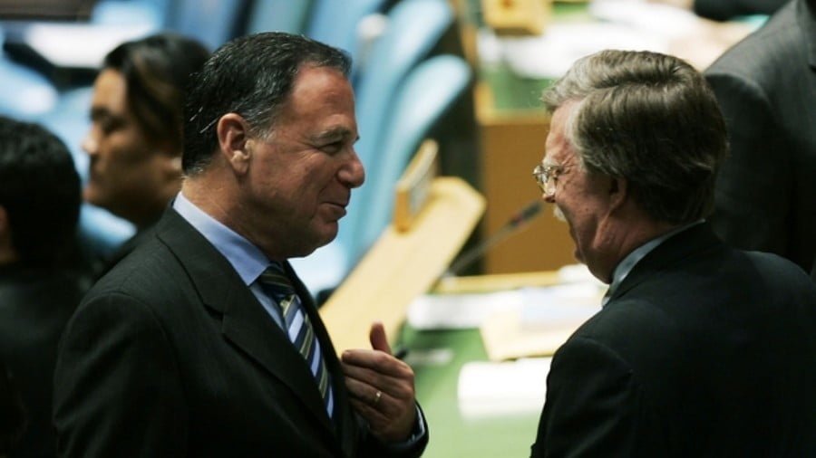 Dan Gillerman, Israel’s ambassador to the UN (L), talks with John Bolton, the US ambassador to the UN, on the assembly floor during the United Nations General Assembly's 61st session on 12 September, 2006 in New York City (AFP)