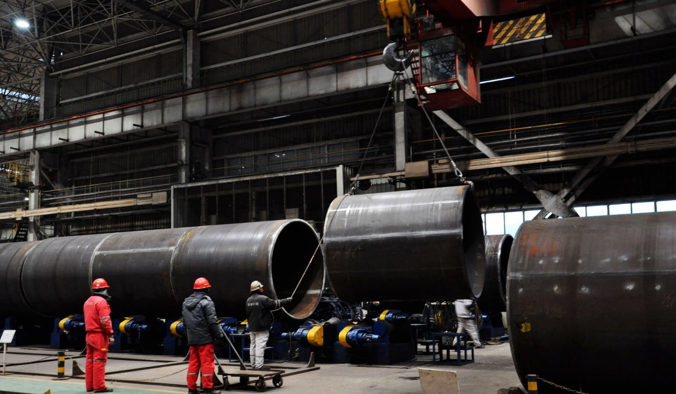 Chinese steel workers in Qingdao. Photo: AFP