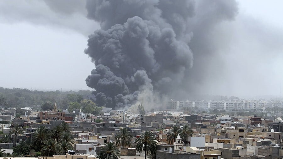 FILE PHOTO: Smoke rises after coalition air strikes in Tripoli, Libya © Reuters