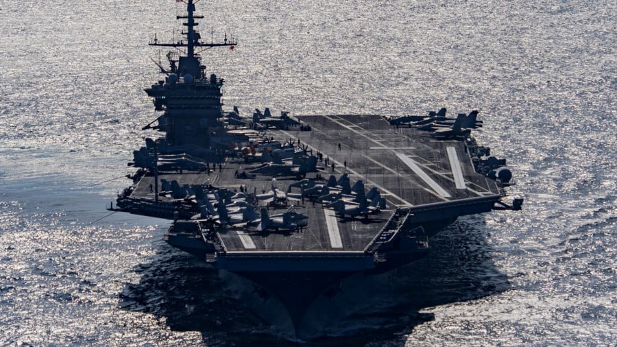 The U.S. Navy, the aircraft carrier USS Harry S. Truman navigates the Gulf of Oman on Dec. 25, 2015. J. M. Tolbert | U.S. Navy via AP