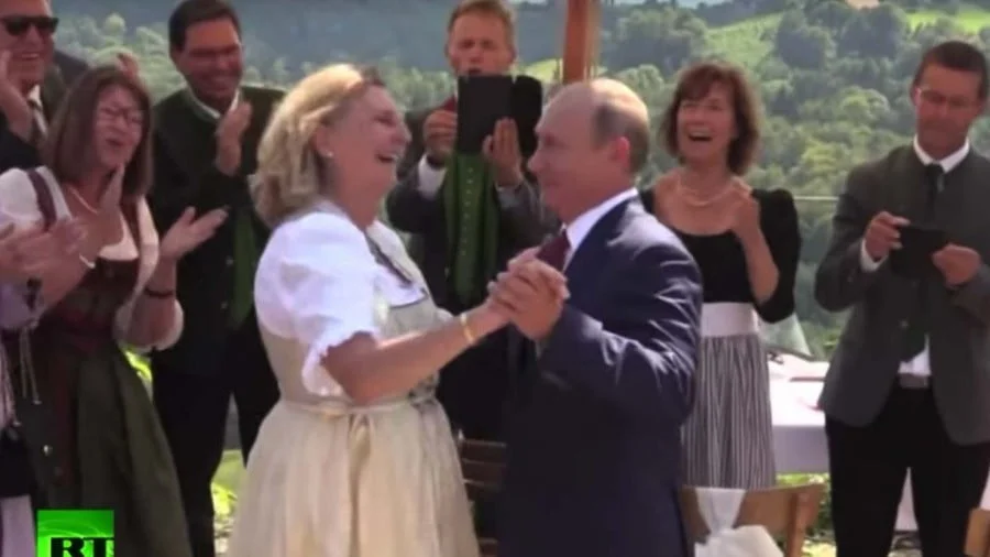 Putin’s Wedding Trip Seals Marriage of Convenience with Merkel