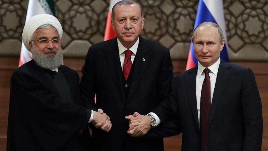 Iran's Hassan Rouhani, Turkey's Recep Tayyip Erdogan and Russia's Vladimir Putin after a summit on Syria on April 4. Photo: AFP/Adem Altan