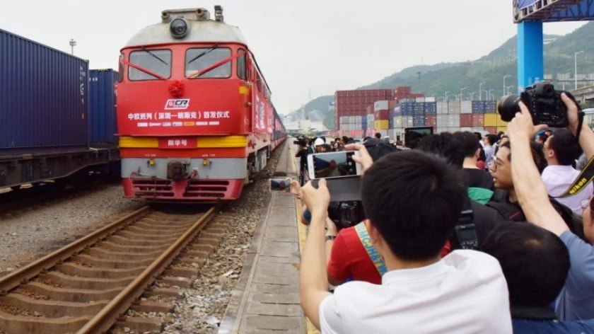People take pictures of the first freight train from Shenzhen to Minsk, capital of Belarus, that set out of Yantian Port in Shenzhen in May 2017. Photo: Reuters / stringer