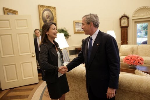 Maria Corina Machado, founder of Sumate, an alleged Venezuelan election monitoring group, funded by the US National Endowment for Democracy (NED), meeting with US President George Bush who presided over the failed 2002 coup attempt seeking to oust President Hugo Chavez.