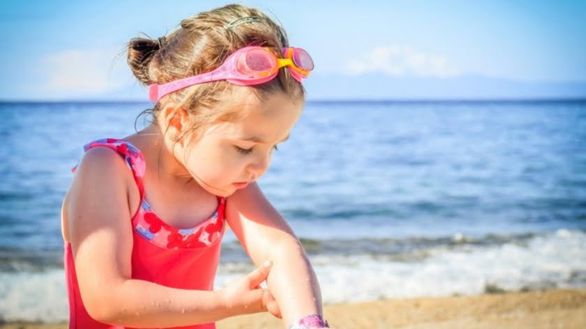From Sunscreen to Bug Spray: How to Protect Your Kids from Chemical Poisoning This Summer