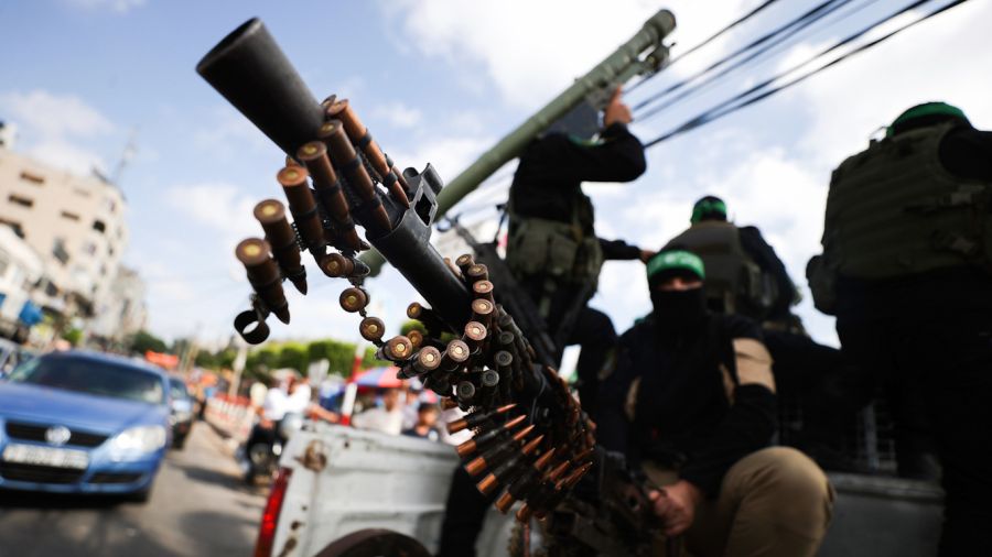 Hamas fighters attend a military exhibition under the name “Resistance, a picture and a souvenir”, on the third day of Eid al-Adha holiday, at the Unknown Soldier Park in the centre of Gaza City. Ahmed Zakot | Sipa via AP Images